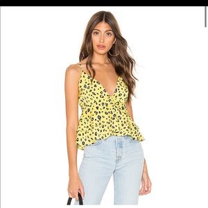 Yellow leopard peplum top from revolve